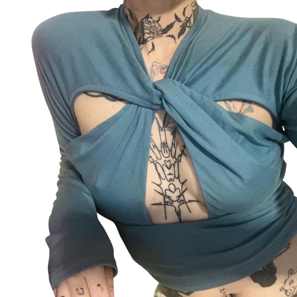 Teal blue long sleeve crop top with cut out detail